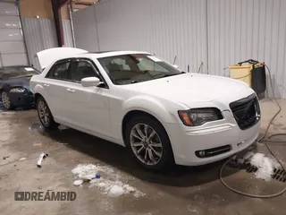 2014 Chrysler 300 with VIN 2C3CCAGGXEH384728, listed as a IAAI auction lot 41394638 with 151,362 mi miles. Bid and sale history available at carsss.com. Image 1.