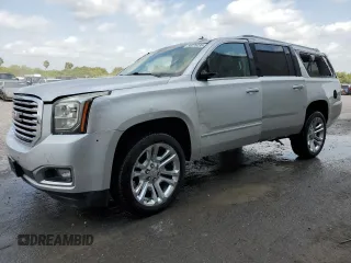 2019 GMC Yukon XL SLT z VIN 1GKS1GKC5KR409622, wystawiony jako Copart lot #55225235 z przebiegiem 100 205 mil mil oraz Szkoda całkowita • Salvage title. Historia ofert i sprzedaży dostępna na DreamBid. Obrazek 1.