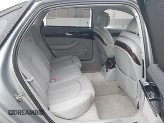 2012 Audi A8 z VIN WAURVAFD5CN008320, wystawiony jako IAAI lot #41508237 z przebiegiem 183 398 mil mil oraz . Historia ofert i sprzedaży dostępna na DreamBid. Obrazek 8.