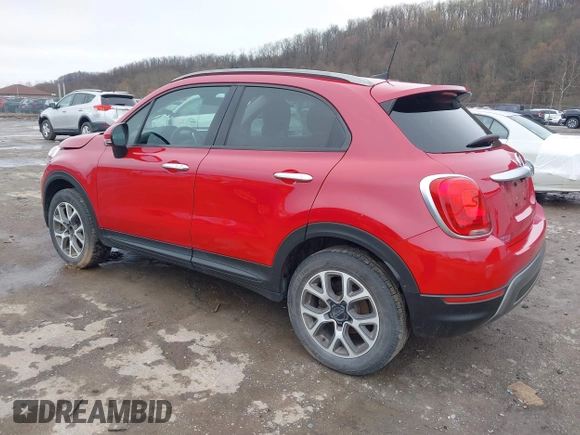 2018 FIAT 500X Trekking z VIN ZFBCFYCB6JP690033, wystawiony jako IAAI lot #41966797 z przebiegiem 129 236 mil mil oraz . Historia ofert i sprzedaży dostępna na DreamBid. Obrazek 3.
