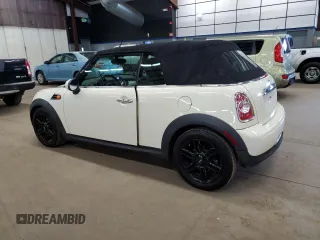 2015 MINI Convertible with VIN WMWZN3C51FT861693, listed as a Copart auction lot 63597565 with 193,157 mi miles and Clean title. Bid and sale history available at DreamBid. Image 2.