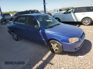 2002 Hyundai Accent GL with VIN KMHCG45C32U332833, listed as a Copart auction lot 66539644 with 69,763 mi miles and Salvage Title. Bid and sale history available at carsss.com. Image 4.