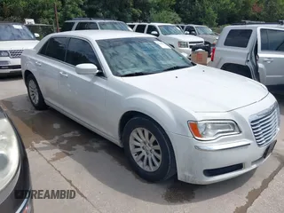 2013 Chrysler 300 with VIN 2C3CCAAG3DH527185, listed as a IAAI auction lot 42528913 with 167,779 mi miles and . Bid and sale history available at DreamBid. Image 1.