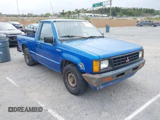 1990 Mitsubishi Mighty Max with VIN JA7FL24W8LP030657, listed as a IAAI auction lot 42014231 with 376,787 mi miles and . Bid and sale history available at DreamBid. Image 1.