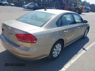 2015 Volkswagen Passat 1.8T Limited Edition with VIN 1VWAT7A34FC032404, listed as a IAAI auction lot 42126991 with 64,820 mi miles. Bid and sale history available at carsss.com. Image 4.