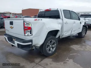 2019 Chevrolet Colorado 4WD Z71 with VIN 1GCGTDEN3K1317883, listed as a IAAI auction lot 41439010 with 34,306 mi miles. Bid and sale history available at carsss.com. Image 4.