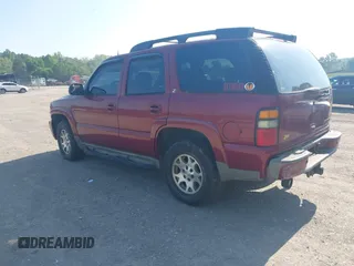 2004 Chevrolet Tahoe LS with VIN 1GNEK13Z94R252144, listed as a IAAI auction lot 42154641 with 201,247 mi miles. Bid and sale history available at carsss.com. Image 3.