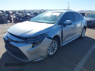 2022 Toyota Corolla LE with VIN 5YFVPMAE8NP312132, listed as a IAAI auction lot 41671016 with 34,598 mi miles. Bid and sale history available at carsss.com. Image 2.