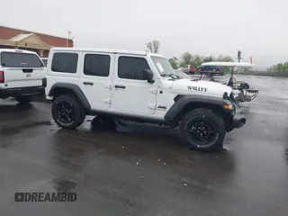 2023 Jeep Wrangler Sport with VIN 1C4HJXDN8PW523532, listed as a IAAI auction lot 41962483 with 14,643 mi miles and . Bid and sale history available at DreamBid. Image 13.