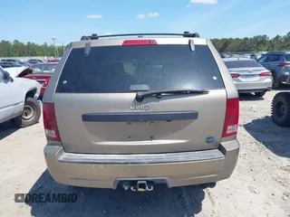 2005 Jeep Grand Cherokee Laredo with VIN 1J4HS48NX5C656582, listed as a IAAI auction lot 42079746 with Not Provided miles and . Bid and sale history available at DreamBid. Image 16.