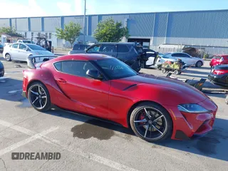 2020 Toyota Supra 3.0 with VIN WZ1DB4C02LW027976, listed as a IAAI auction lot 41264307 with 53,382 mi miles and . Bid and sale history available at DreamBid. Image 1.
