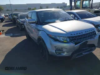 2013 Land Rover Range Rover Evoque Pure z VIN SALVN2BGXDH730673, wystawiony jako IAAI lot #41647641 z przebiegiem 65 970 mil mil oraz . Historia ofert i sprzedaży dostępna na DreamBid. Obrazek 1.