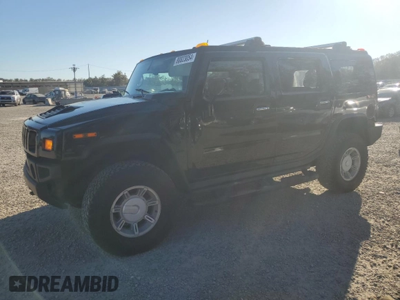 2003 Hummer H2 with VIN 5GRGN23UX3H136571, listed as a Copart auction lot 80823054 with 220,003 mi miles and Salvage Title. Bid and sale history available at carsss.com. Image 1.
