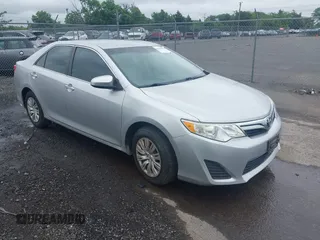 2012 Toyota Camry L z VIN 4T4BF1FK0CR157600, wystawiony jako IAAI lot #42438078 z przebiegiem 94 310 mil mil oraz . Historia ofert i sprzedaży dostępna na DreamBid. Obrazek 1.