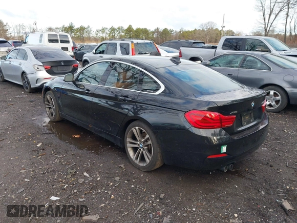2018 BMW 4 Series 430i xDrive with VIN WBA4J3C56JBG91516, listed as a IAAI auction lot 41824273 with 102,932 mi miles and . Bid and sale history available at DreamBid. Image 3.