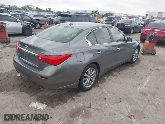 2015 Infiniti Q50 Premium z VIN JN1BV7AR9FM413801, wystawiony jako IAAI lot #42134770 z przebiegiem 111 367 mil mil oraz . Historia ofert i sprzedaży dostępna na DreamBid. Obrazek 4.
