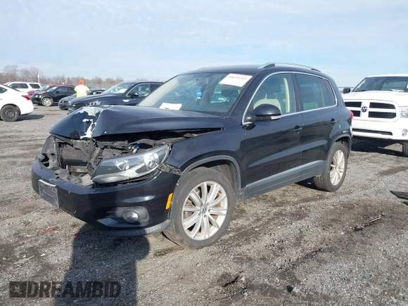 2012 Volkswagen Tiguan SE with VIN WVGAV7AX3CW531264, listed as a IAAI auction lot 41651242 with 190,669 mi miles and . Bid and sale history available at DreamBid. Image 17.