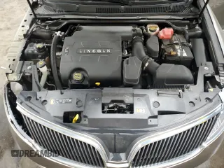 2016 Lincoln MKS с VIN 1LNHL9DK3GG600907, выставлен на аукционе Copart как лот 56892995 с пробегом 122 220 миль миль и Списание • Salvage title. История ставок и продаж доступна на DreamBid. Изображение 11.