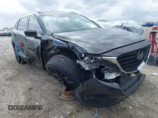 2022 Mazda CX-9 Touring Plus with VIN JM3TCBAYXN0613830, listed as a IAAI auction lot 41942849 with 50,193 mi miles and . Bid and sale history available at DreamBid. Image 1.