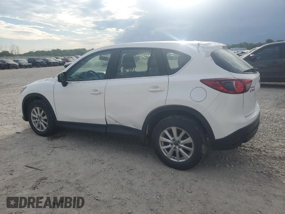 2016 Mazda CX-5 Sport with VIN JM3KE2BY0G0729349, listed as a Copart auction lot 62469735 with 88,247 mi miles and Salvage title. Bid and sale history available at DreamBid. Image 2.