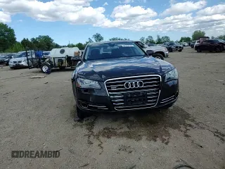 2012 Audi A8 z VIN WAURVAFD2CN021722, wystawiony jako Copart lot #58353745 z przebiegiem 117 302 mil mil oraz Szkoda całkowita • Salvage title. Historia ofert i sprzedaży dostępna na DreamBid. Obrazek 13.