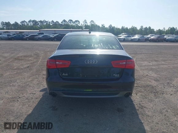 2015 Audi A6 3.0T Prestige with VIN WAUHGAFC3FN011654, listed as a IAAI auction lot 42104153 with 166,719 mi miles. Bid and sale history available at carsss.com. Image 16.