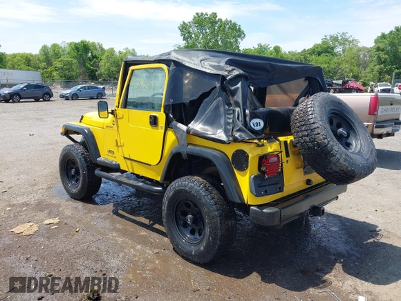 2005 Jeep Wrangler Sport with VIN 1J4FA49S65P381798, listed as a IAAI auction lot 42305109 with 71,880 mi miles and . Bid and sale history available at DreamBid. Image 3.