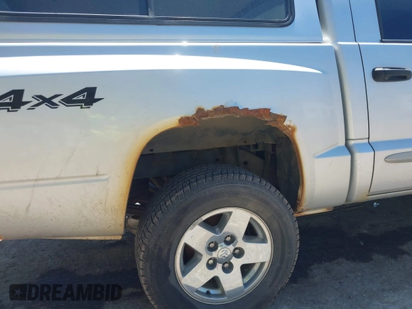 2005 Dodge Dakota SLT with VIN 1D7HW48N45S321002, listed as a IAAI auction lot 42240338 with 214,983 mi miles and . Bid and sale history available at DreamBid. Image 21.