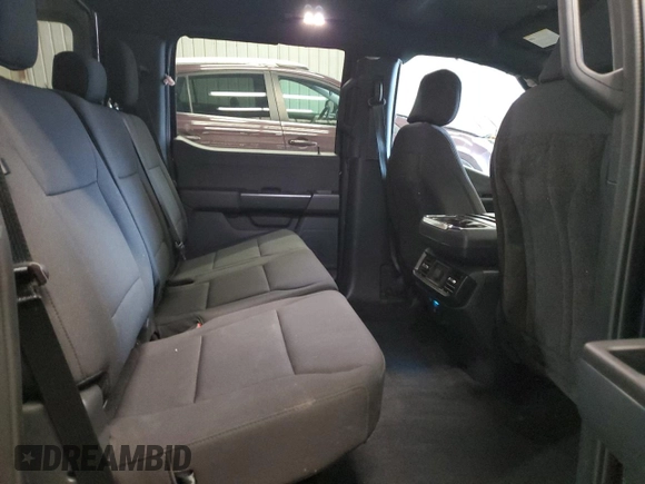 2023 Ford F-150 with VIN 1FTFW1P83PKE89261, listed as a Copart auction lot 46786025 with 9,079 mi miles and Salvage title. Bid and sale history available at DreamBid. Image 10.