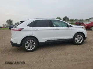 2020 Ford Edge SEL z VIN 2FMPK4J95LBB21392, wystawiony jako Copart lot #60912275 z przebiegiem 82 527 mil mil oraz Szkoda całkowita • Salvage title. Historia ofert i sprzedaży dostępna na DreamBid. Obrazek 3.