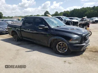 2015 Ram 1500 Rebel z VIN 1C6RR7YT4FS751370, wystawiony jako Copart lot #61675064 z przebiegiem 90 245 mil mil oraz Szkoda całkowita • Salvage title. Historia ofert i sprzedaży dostępna na DreamBid. Obrazek 4.