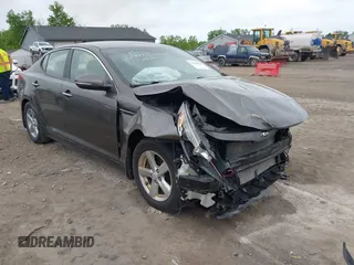 2014 Kia Optima LX with VIN 5XXGM4A74EG271218, listed as a IAAI auction lot 42364865 with 144,350 mi miles and . Bid and sale history available at DreamBid. Image 1.