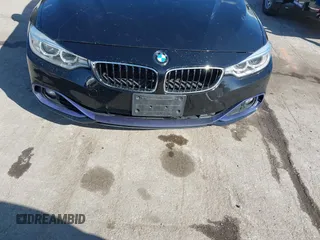 2016 BMW 4 Series 428i xDrive with VIN WBA4C9C53GG135945, listed as a IAAI auction lot 41964691 with 93,273 mi miles and . Bid and sale history available at carsss.com. Image 6.