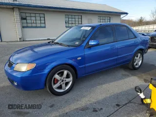 2003 Mazda Protege DX with VIN JM1BJ226331155756, listed as a Copart auction lot 48555135 with 164,718 mi miles and Salvage Title. Bid and sale history available at DreamBid. Image 1.