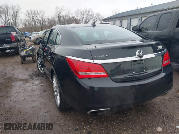 2014 Buick LaCrosse Premium II with VIN 1G4GF5G39EF305104, listed as a IAAI auction lot 41715121 with 81,341 mi miles and . Bid and sale history available at DreamBid. Image 3.