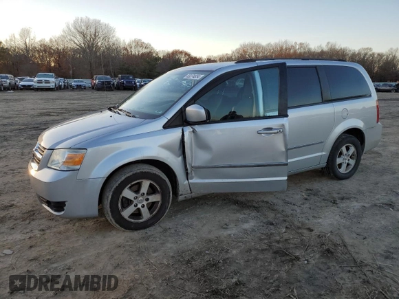 2010 Dodge Grand Caravan SXT with VIN 2D4RN5D16AR496795, listed as a Copart auction lot 83374834 with 99,902 mi miles and Salvage Title. Bid and sale history available at DreamBid. Image 1.