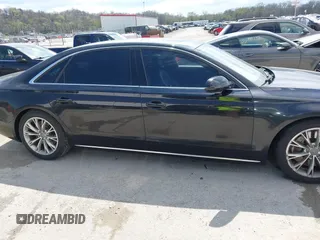 2012 Audi A8 L with VIN WAURVAFD5CN038949, listed as a IAAI auction lot 41914575 with 85,634 mi miles. Bid and sale history available at carsss.com. Image 13.