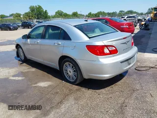 2008 Chrysler Sebring Touring z VIN 1C3LC56K58N267552, wystawiony jako IAAI lot #42273582 z przebiegiem 137 007 mil mil oraz . Historia ofert i sprzedaży dostępna na DreamBid. Obrazek 3.