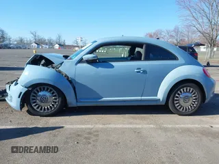 2014 Volkswagen Beetle 2.5L w/Sun with VIN 3VWJP7AT6EM601318, listed as a IAAI auction lot 41902598 with 169,220 mi miles and . Bid and sale history available at DreamBid. Image 14.