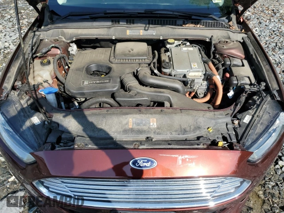 2016 Ford Fusion SE Hybrid z VIN 3FA6P0LU5GR377735, wystawiony jako Copart lot #58791955 z przebiegiem 135 798 mil mil oraz Szkoda całkowita • Salvage title. Historia ofert i sprzedaży dostępna na DreamBid. Obrazek 11.