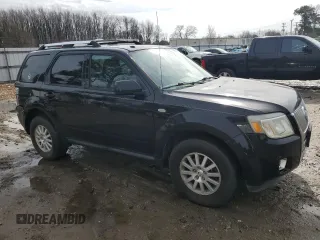 2009 Mercury Mariner Premier z VIN 4M2CU87719KJ20338, wystawiony jako Copart lot #42972595 z przebiegiem 148 871 mil mil oraz Szkoda całkowita • Salvage title. Historia ofert i sprzedaży dostępna na DreamBid. Obrazek 4.