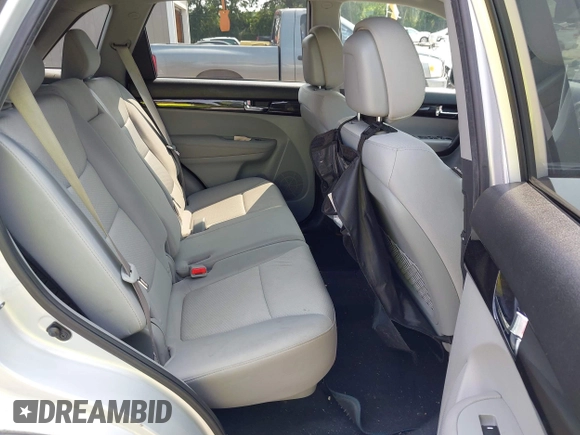 2013 Kia Sorento LX with VIN 5XYKT3A6XDG361675, listed as a IAAI auction lot 42402112 with 172,414 mi miles and . Bid and sale history available at DreamBid. Image 8.