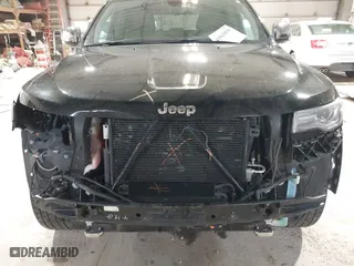 2014 Jeep Grand Cherokee Overland with VIN 1C4RJFCGXEC162109, listed as a IAAI auction lot 41943979 with 147,788 mi miles. Bid and sale history available at carsss.com. Image 13.