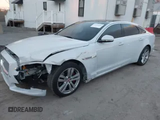 2017 Jaguar XJ with VIN SAJWJ2GD5H8W08395, listed as a IAAI auction lot 41014883 with 80,584 mi miles. Bid and sale history available at carsss.com. Image 2.
