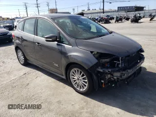 2015 Ford C-Max Energi SEL with VIN 1FADP5CU0FL115641, listed as a Copart auction lot 46487404 with 97,970 mi miles. Bid and sale history available at carsss.com. Image 4.