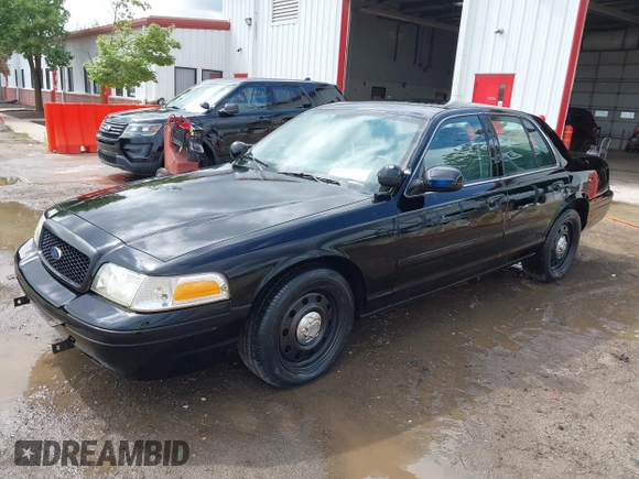 2005 Ford Police Interceptor z VIN 2FAHP71WX5X154384, wystawiony jako IAAI lot #40735796 z przebiegiem 84 143 mil mil oraz . Historia ofert i sprzedaży dostępna na DreamBid. Obrazek 2.
