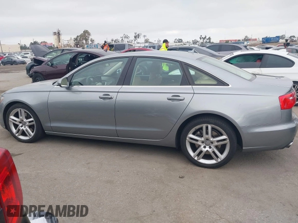 2015 Audi A6 Premium Plus z VIN WAUGFAFC6FN009203, wystawiony jako IAAI lot #42242726 z przebiegiem 69 163 mil mil oraz . Historia ofert i sprzedaży dostępna na DreamBid. Obrazek 14.