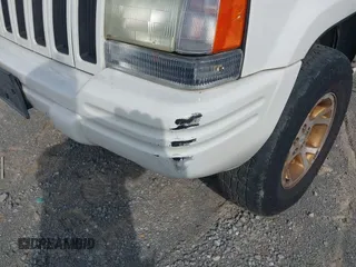 1998 Jeep Grand Cherokee Limited z VIN 1J4GZ78Y9WC342250, wystawiony jako IAAI lot #42047991 z przebiegiem 271 579 mil mil oraz . Historia ofert i sprzedaży dostępna na DreamBid. Obrazek 6.