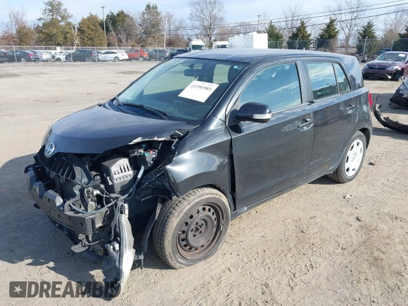 2010 Scion xD with VIN JTKKU4B43AJ055535, listed as a IAAI auction lot 41596985 with 200,000 mi miles. Bid and sale history available at carsss.com. Image 2.