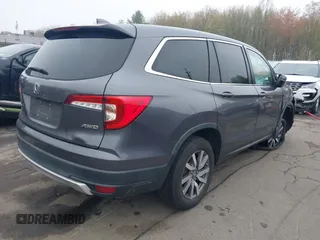 2020 Honda Pilot EX-L with VIN 5FNYF6H5XLB024719, listed as a IAAI auction lot 42168150 with 90,933 mi miles and . Bid and sale history available at carsss.com. Image 4.
